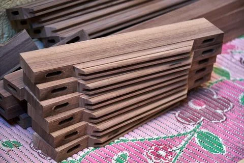 Solid wallnut cabinet doors. Solid wood chest of drawers. Furniture manufactu Stock Photos