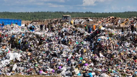 Solid waste disposal on landfill. Landfill with solid household waste. Video stock 218447023