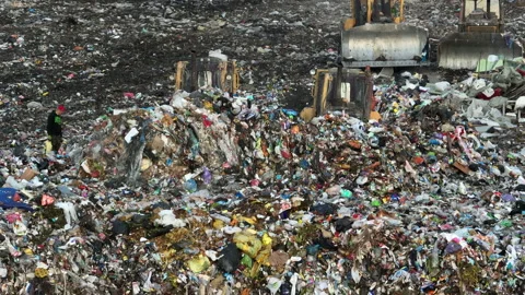 Solid waste disposal on landfill. Landfill with solid household waste. Stock Footage 218449393