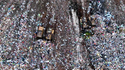 Solid waste disposal on landfill. Landfill with solid household waste. Video stock 218453036