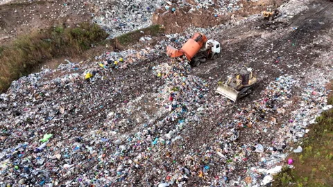 Solid waste disposal on landfill. Landfill with solid household waste. Stock-Footage 218466368