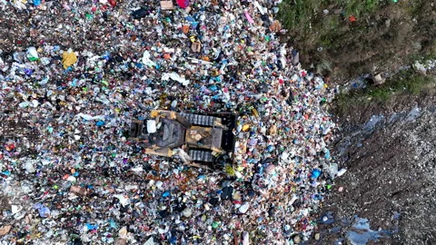 Solid waste disposal on landfill. Landfill with solid household waste. Видео 218497233