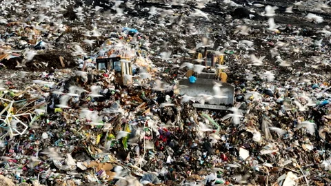Solid waste disposal on landfill. Landfill with solid household waste. Stock Footage 218520317