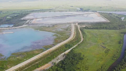 Solid waste landfill at a thermal power plant. Aerial view of a crowded ash dump Stock Footage 159518037