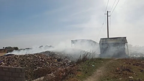 Solid Waste Refuse Burning By Roadside Naibawa Kano Nigeria Stock-Footage 325960856