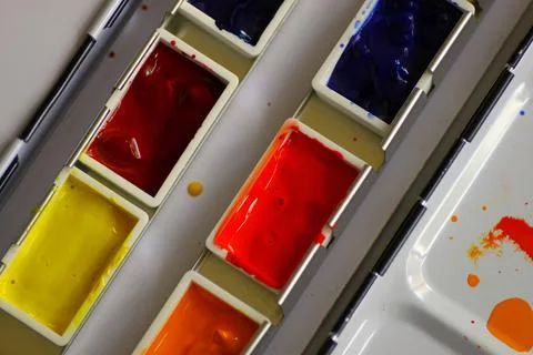 Solid watercolor tiles in cold and warm colors. Color mixing study Stock Photos