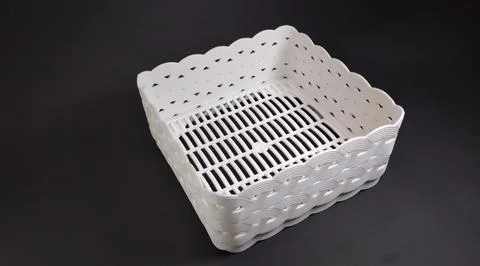 Solid white Plastic Storage Box in square shape, with woven texture, black .. Stock Photos