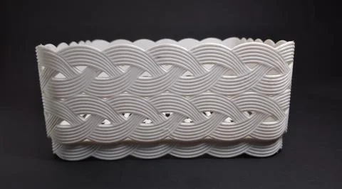 Solid white Plastic Storage Box in square shape, with woven texture, black .. Foto stock