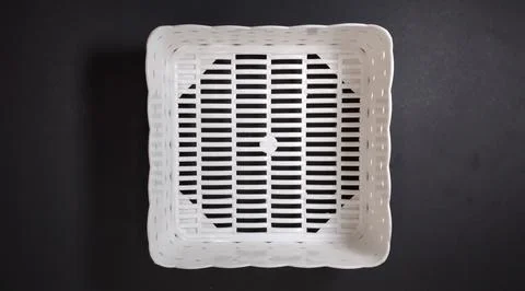 Solid white Plastic Storage Box in square shape, with woven texture, black .. Stock Photos