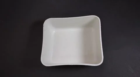 Solid white Plastic Storage Box in square shape, black background. Stock Photos