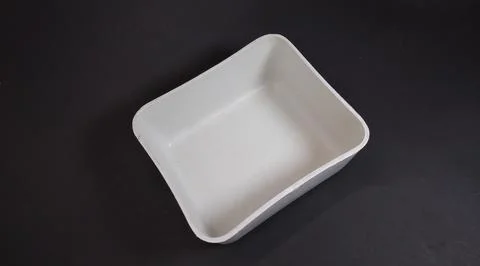 Solid white Plastic Storage Box in square shape, black background. Stock Photos