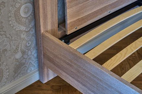 Solid wood bed in modern scandinavian style close-up 스톡 사진