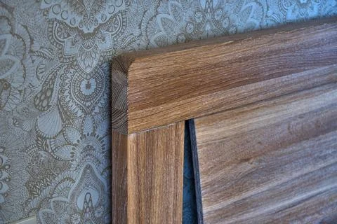 Solid wood bed in modern scandinavian style close-up Stock Photos