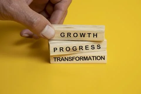 Solid wooden locks on a yellow background Stock Photos