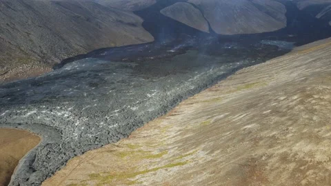 Solidified black lava in a valley after a volcanic eruption in Iceland Stock Footage 226578554