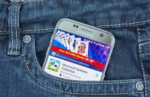 Solitaire Collection games mobile application on screen of Samsung Stock Photos