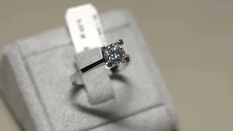 Solitaire ring pearl ring. Diamond ring hand made jewelery macro close up Stock Footage 118687210