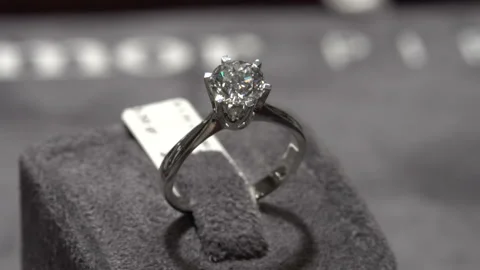 Solitaire ring shine. Diamond ring hand made jewelery macro close up Stock Footage 139635740