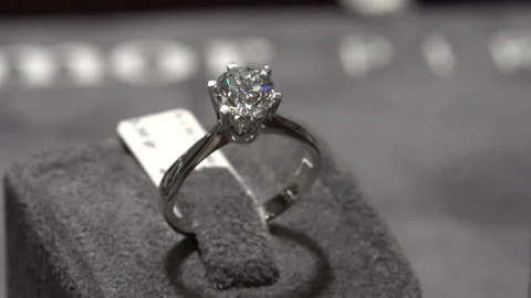 Solitaire ring shine. Diamond ring hand made jewelery macro close up Stock Footage 139637763