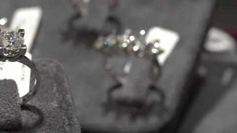 Solitaire ring shine panning. Diamond ring hand made jewelery Stock Footage 139734175