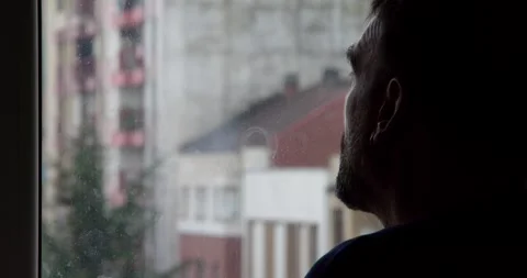 Solitary Contemplation by the Window: Stock Footage 331537355