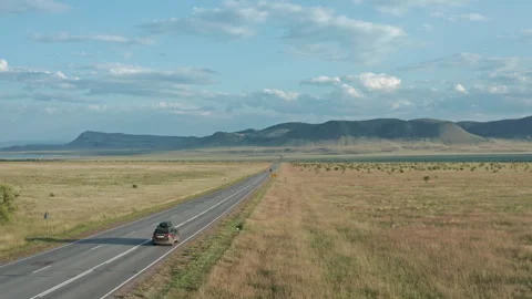 The Solitary Path Through Vast Empty Lands: An Aerial Perspective of a Remote Stock-Footage 257169672