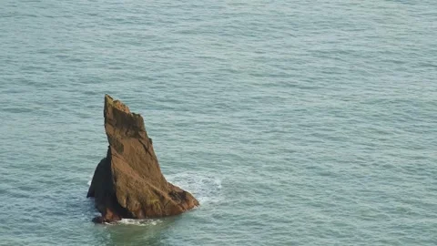 Solitary Sea Stack in the North Atlantic, Iceland Stock Footage 320199064
