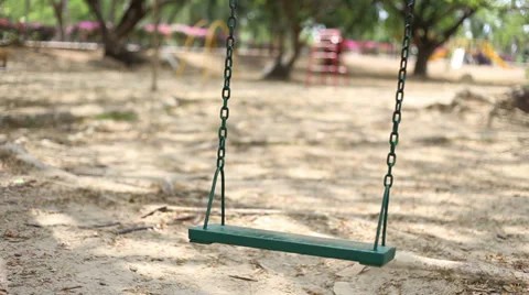 Solitary Swing In The Park Includes birds audio. Stock Footage 35733095