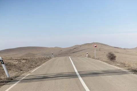 Solitudes Path: An Empty Road Through the Desert Stock Photos
