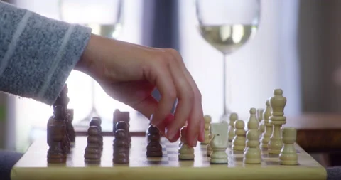 Solo chess, a simple way to de-stress. 4k video footage of an unrecognisable Stock Footage 201122174