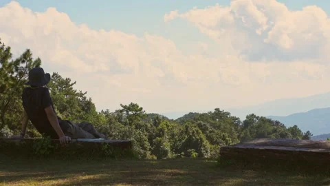 Solo freelancer man camping work outdoor and relax with layer of mountain Stock Footage 270130557