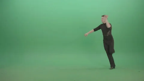 Solo man performing salsa style latino dance on green background Stock Footage 147918803