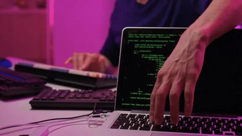 Solo software engineer working through technical issues late at night. Dedicated Stock Footage 347874677