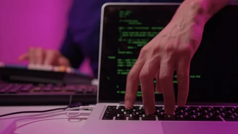 Solo software engineer working through technical issues late at night. Dedicated Stock Footage 347874678