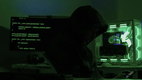 Solo software engineer working through technical issues late at night. Dedicated Stock Footage 347875258