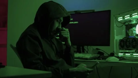 Solo software engineer working through technical issues late at night. Dedicated Stock Footage 347875270