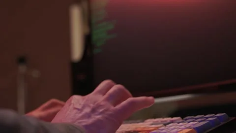 Solo software engineer working through technical issues late at night. Dedicated Stock Footage 347877869