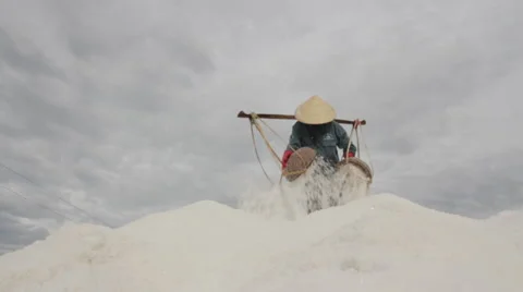 Solo Worker Dumps Salt Stock Footage 42430394