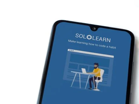 SoloLearn - Learning coding app launch screen with logo on the display of a b Stock Photos