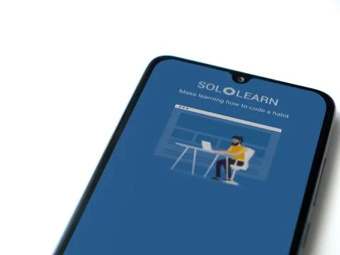 SoloLearn - Learning coding app launch screen with logo on the display of a b Stock Photos