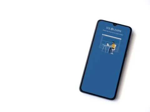 SoloLearn - Learning coding app launch screen with logo on the display of a b Stock Photos