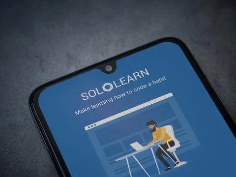 SoloLearn - Learning coding app launch screen with logo on the display of a b Stock Photos