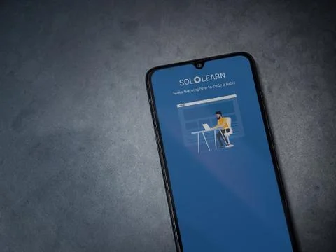 SoloLearn - Learning coding app launch screen with logo on the display of a b Stock Photos