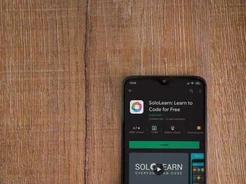 SoloLearn - Learning coding app play store page on the display of a black mob Stock Photos