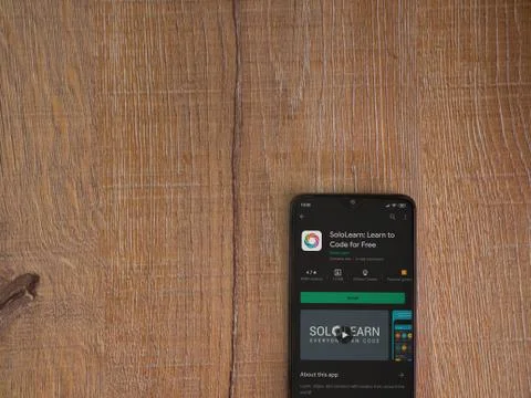 SoloLearn - Learning coding app play store page on the display of a black mob Stock Photos