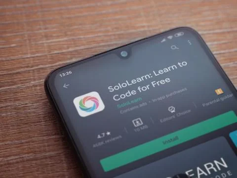 SoloLearn - Learning coding app play store page on the display of a black mob Stock Photos