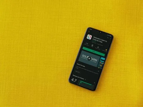 SoloLearn - Learning coding app play store page on the display of a black mob Stock Photos