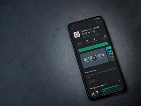 SoloLearn - Learning coding app play store page on the display of a black mob Stock Photos