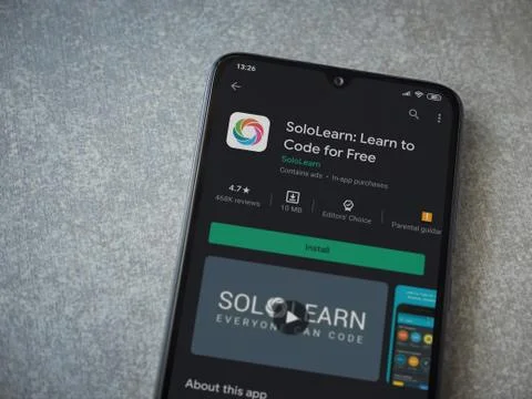 SoloLearn - Learning coding app play store page on the display of a black mob Stock Photos