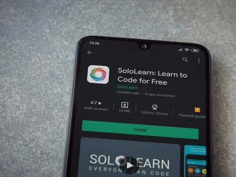 SoloLearn - Learning coding app play store page on the display of a black mob Stock Photos